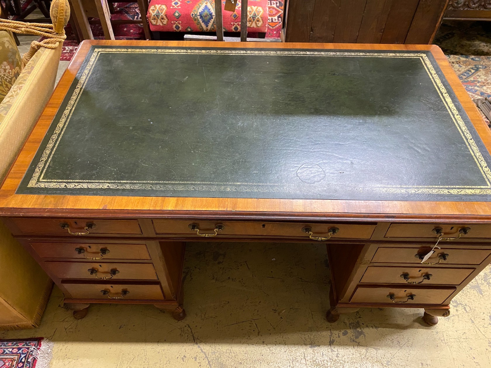 A reproduction George III style walnut pedestal desk, length 152cm, depth 91cm, height 77cm